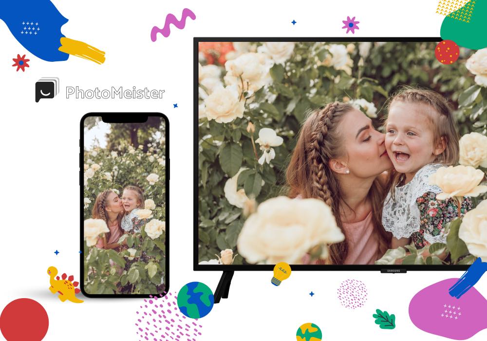iPhone and Smart Tv displaying the same image of a mother kissing a daughter on a cheek among flowers. There's a PhotoMeister logo above the iPhone